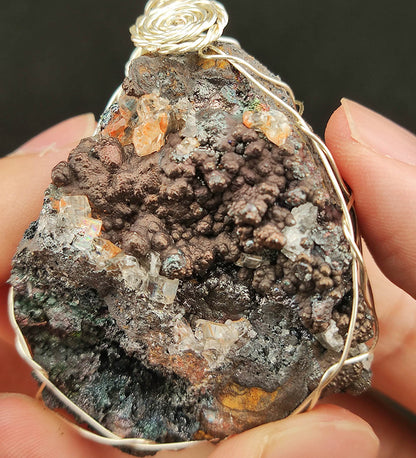 | Goethite Pendant Copper Wire Wrapped Gemstone Pendant | COLOUR:Gold,Turgite with black Calcite & Orange Quartz,Crystal | 100% natural color |